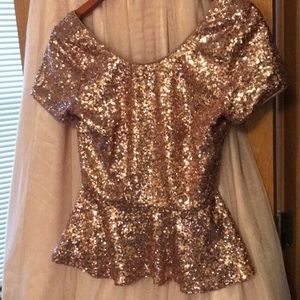 Rose gold sequin peplum top